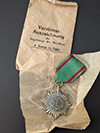 Eastern Peoples medal 2nd Class in gold without swords and paper packet